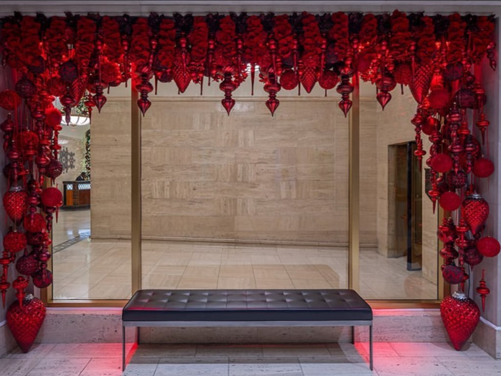 Dramatic red commercial holiday ceiling installation
